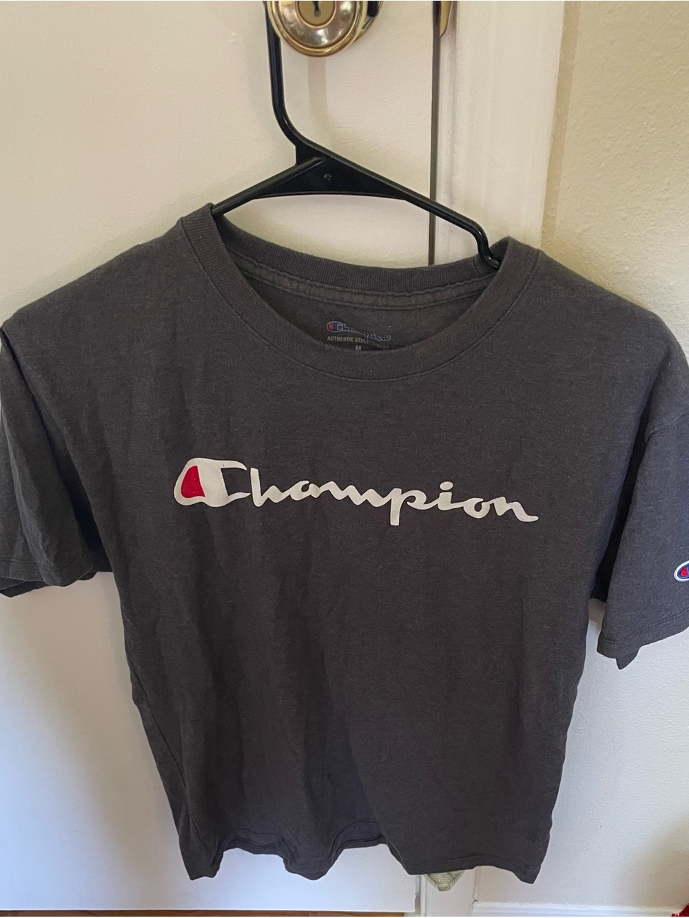 Champion Black Tee with White Script and Red Accent